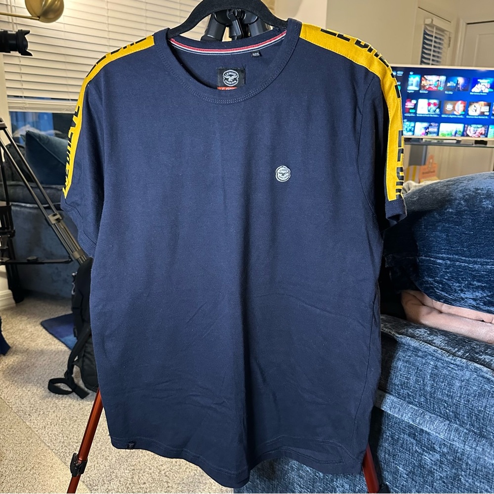 Le Breve Navy Blue Scoop Hemline Crewneck T-Shirt with La Breve Logo Yellow
